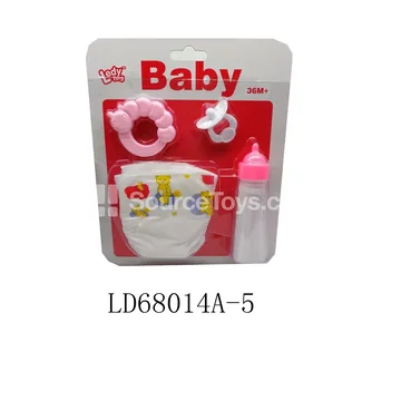 Baby Doll Rattle, Pacifier, Diaper & Bottle Set